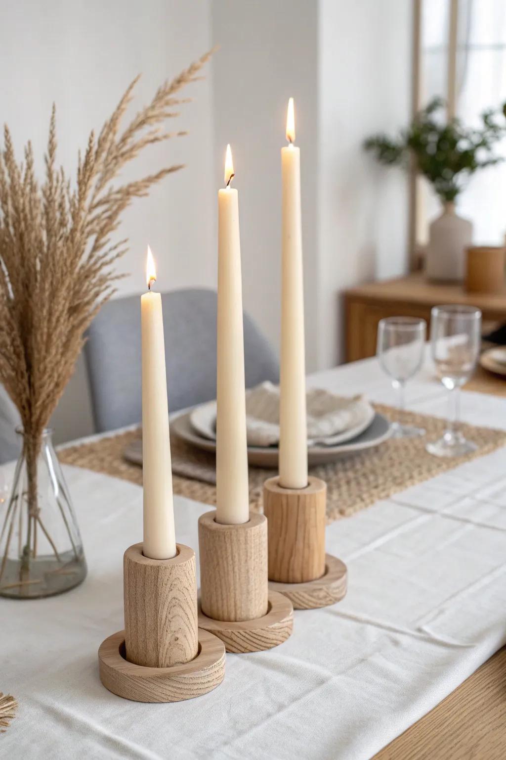 Three minimal tapers in oak holders—simple, cozy candlelight that elevates any dinner.