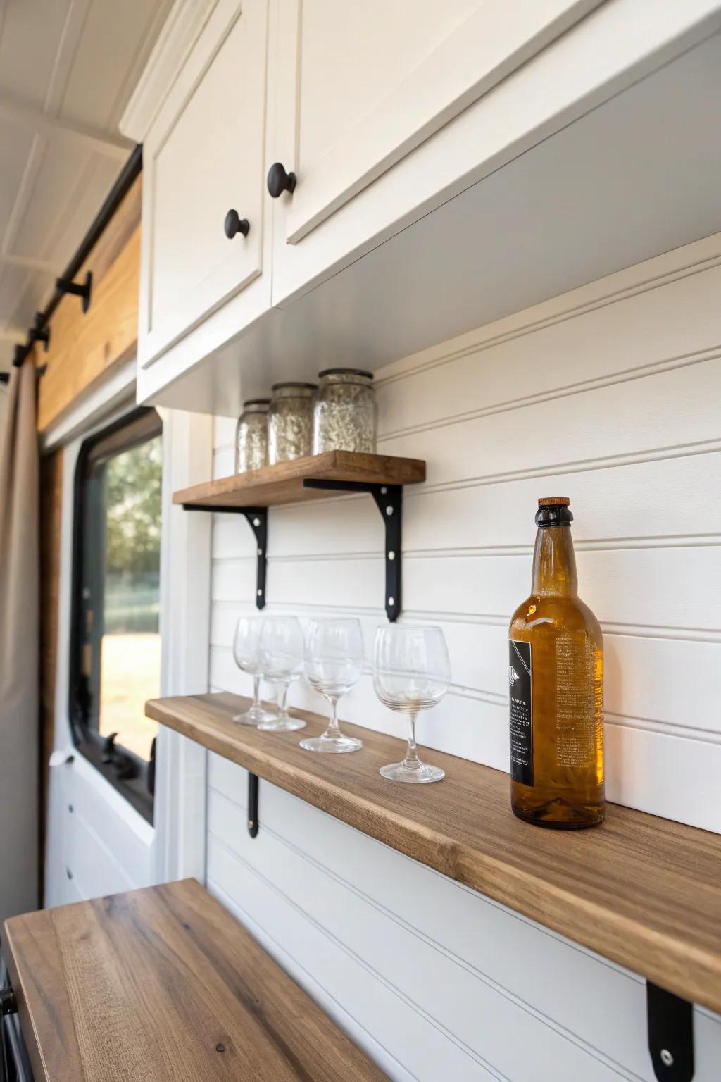 Shiplap behind an RV bar adds instant farmhouse charm and makes open shelving feel intentional.