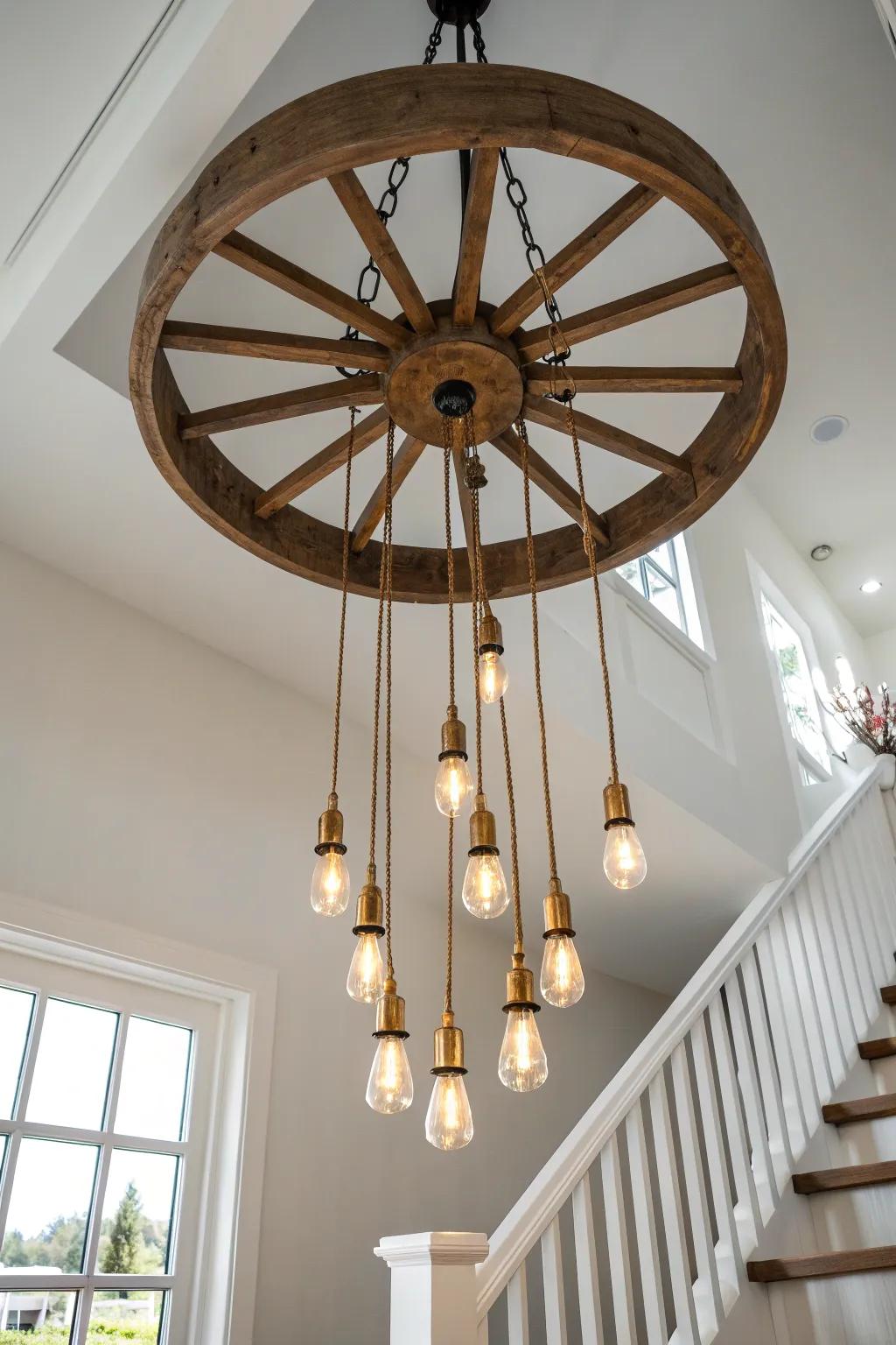 A wagon wheel chandelier with tiered drops that cascades like a glowing waterfall.