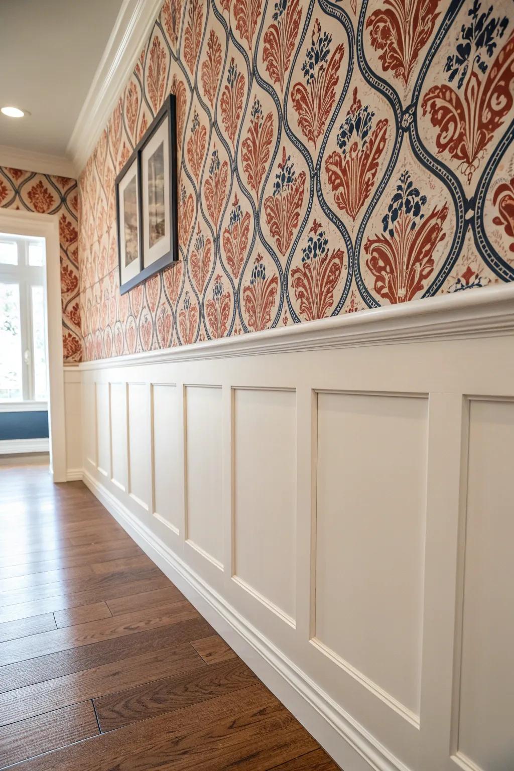 Wainscoting below, wallpaper above—this crisp chair-rail transition adds instant dining room charm.