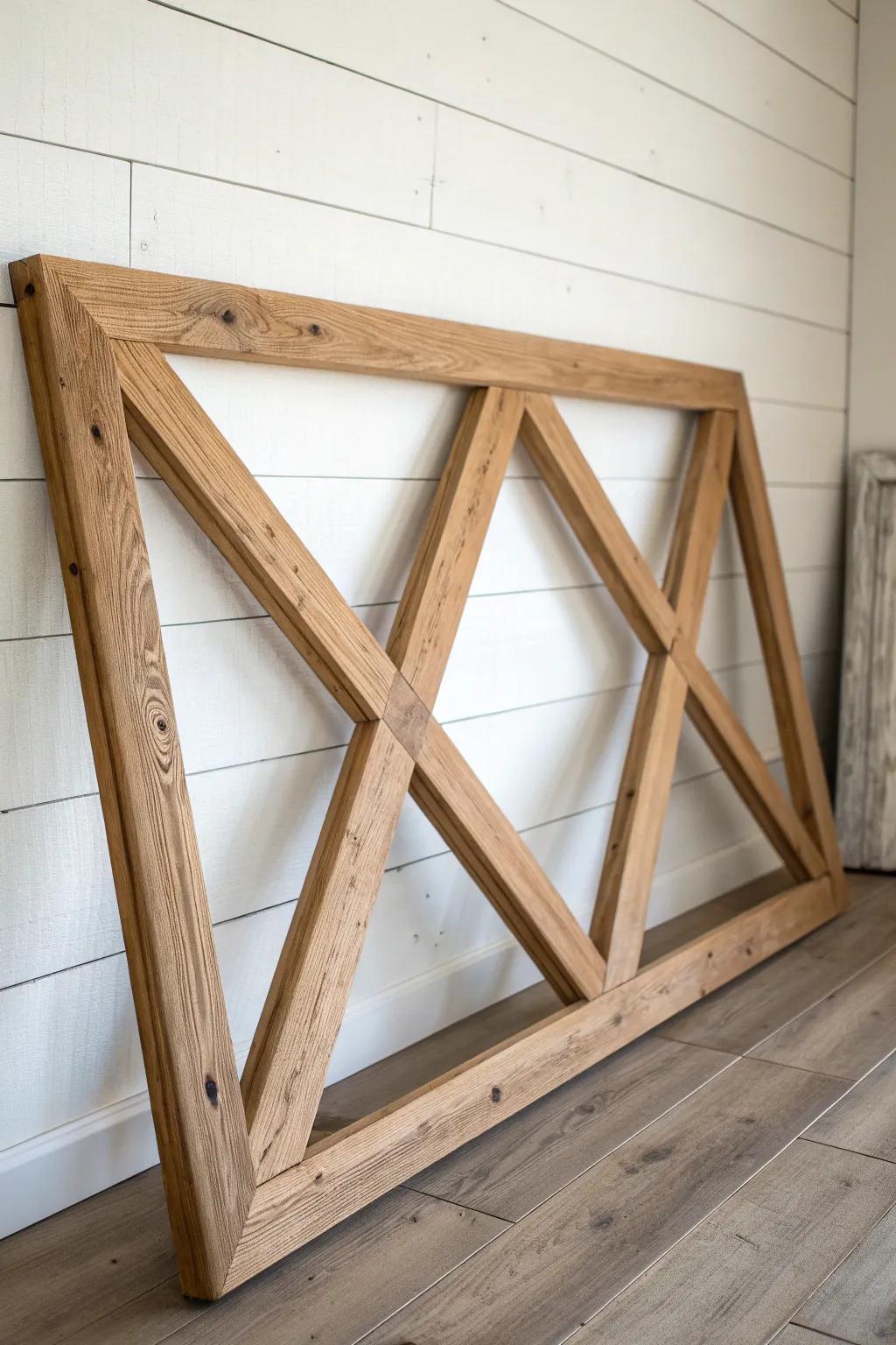 Rustic truss framing in warm oak—barn charm meets modern minimalism with bold shadow play.