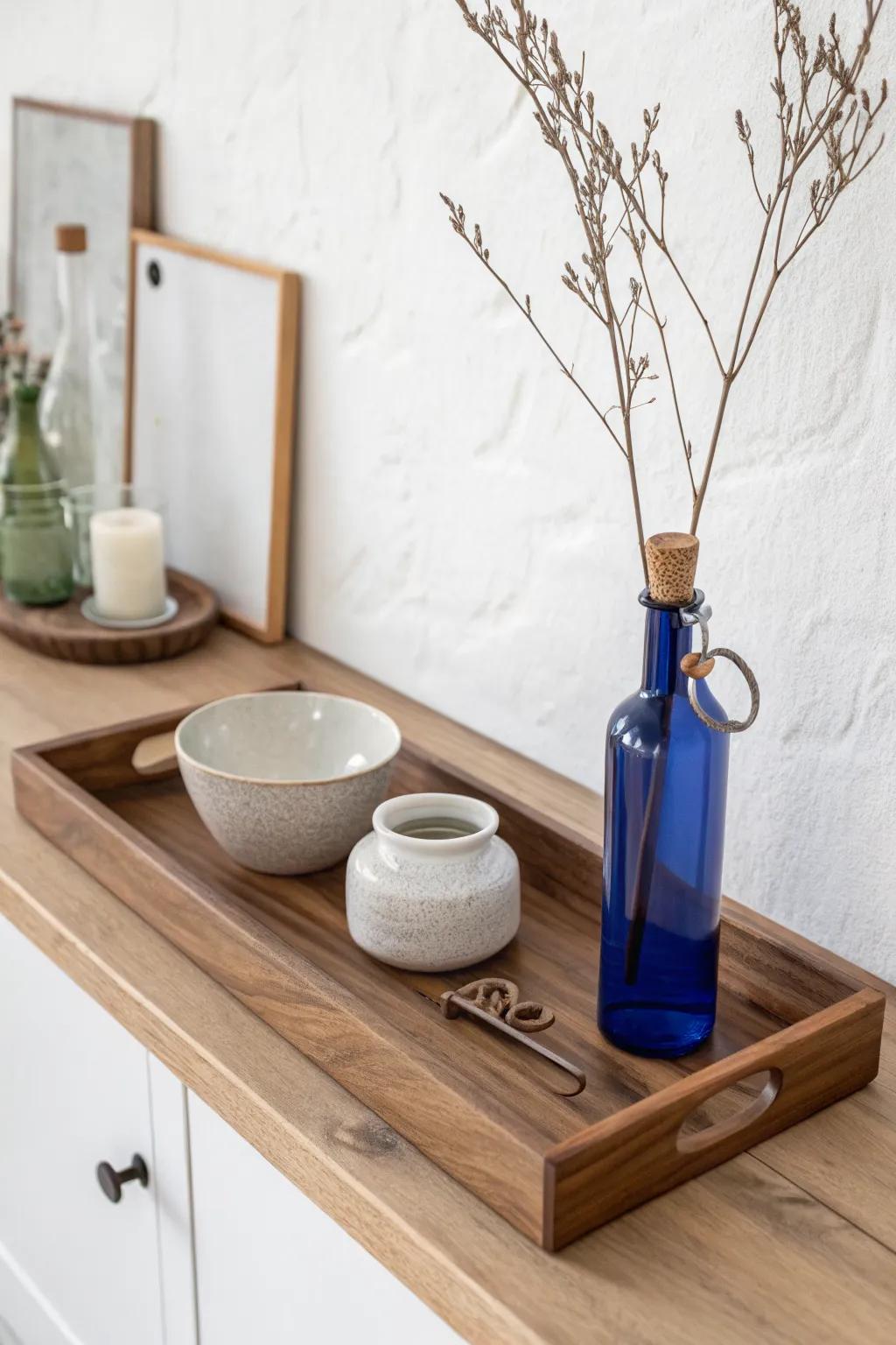 One long wooden tray turns sideboard clutter into a calm, crafted everyday moment.