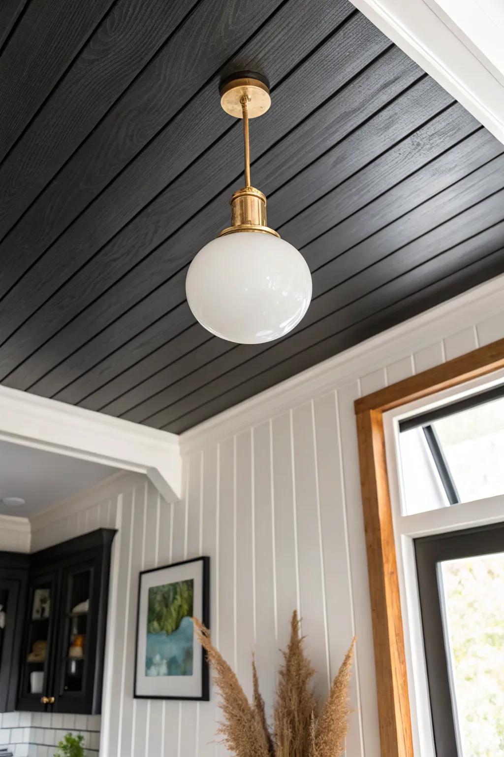 Matte black plank ceiling makes the pendant pop—Scandi clean, warm boho edge at home.