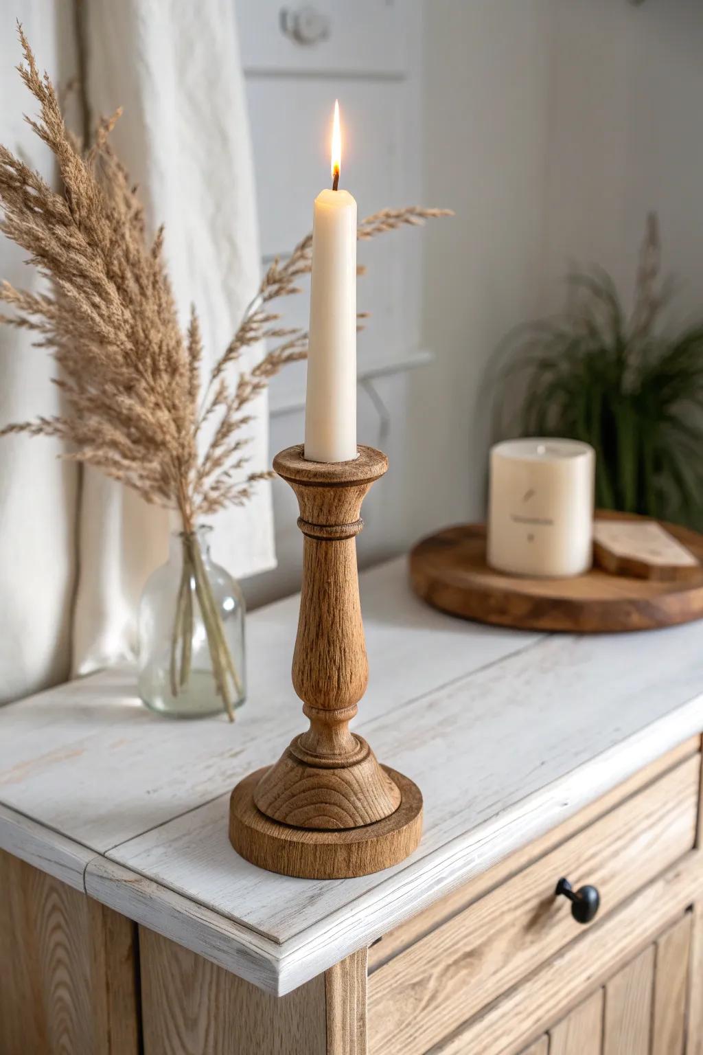 Warm candlelight and handcrafted wood candlesticks add instant cozy charm to a pie safe.