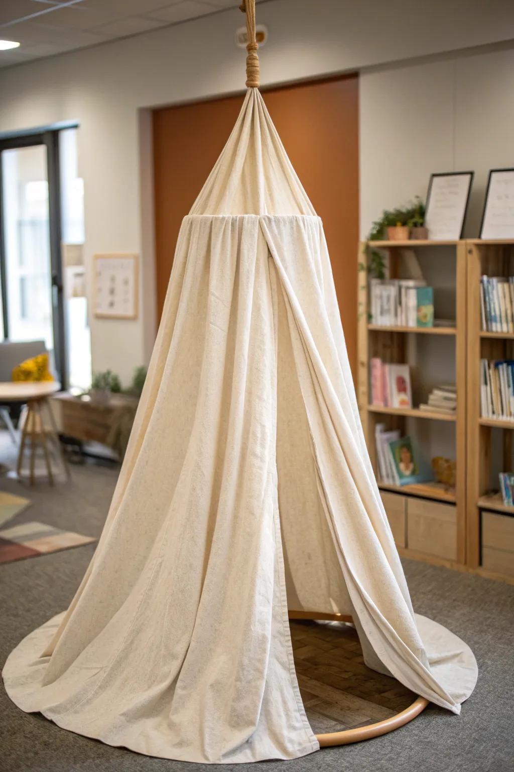 A simple linen canopy on an oak dowel turns the reading corner into a cozy hideaway.