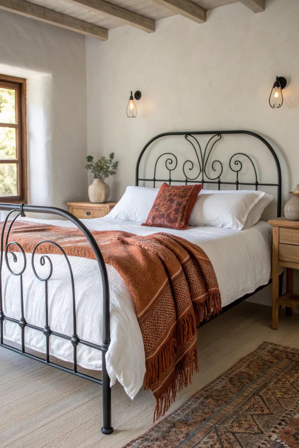 Airy wrought-iron bed meets warm oak plank nightstands for rustic country charm.
