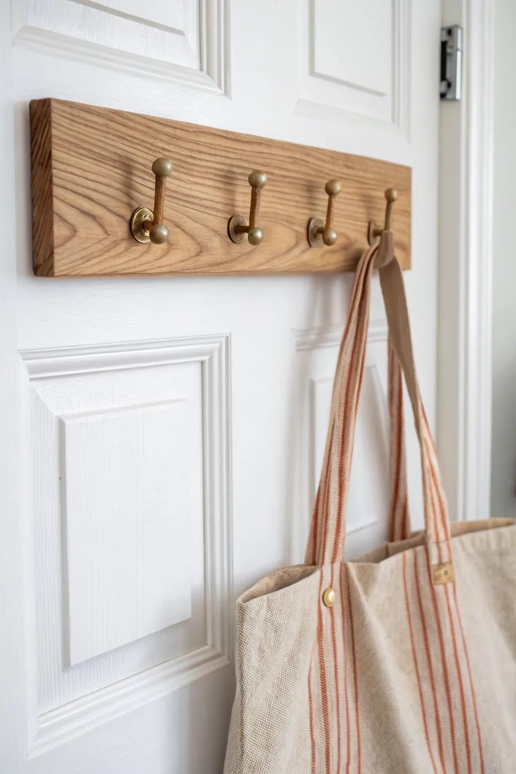 Over-the-door oak hook board: zero-wall-space storage with a warm, minimalist look.