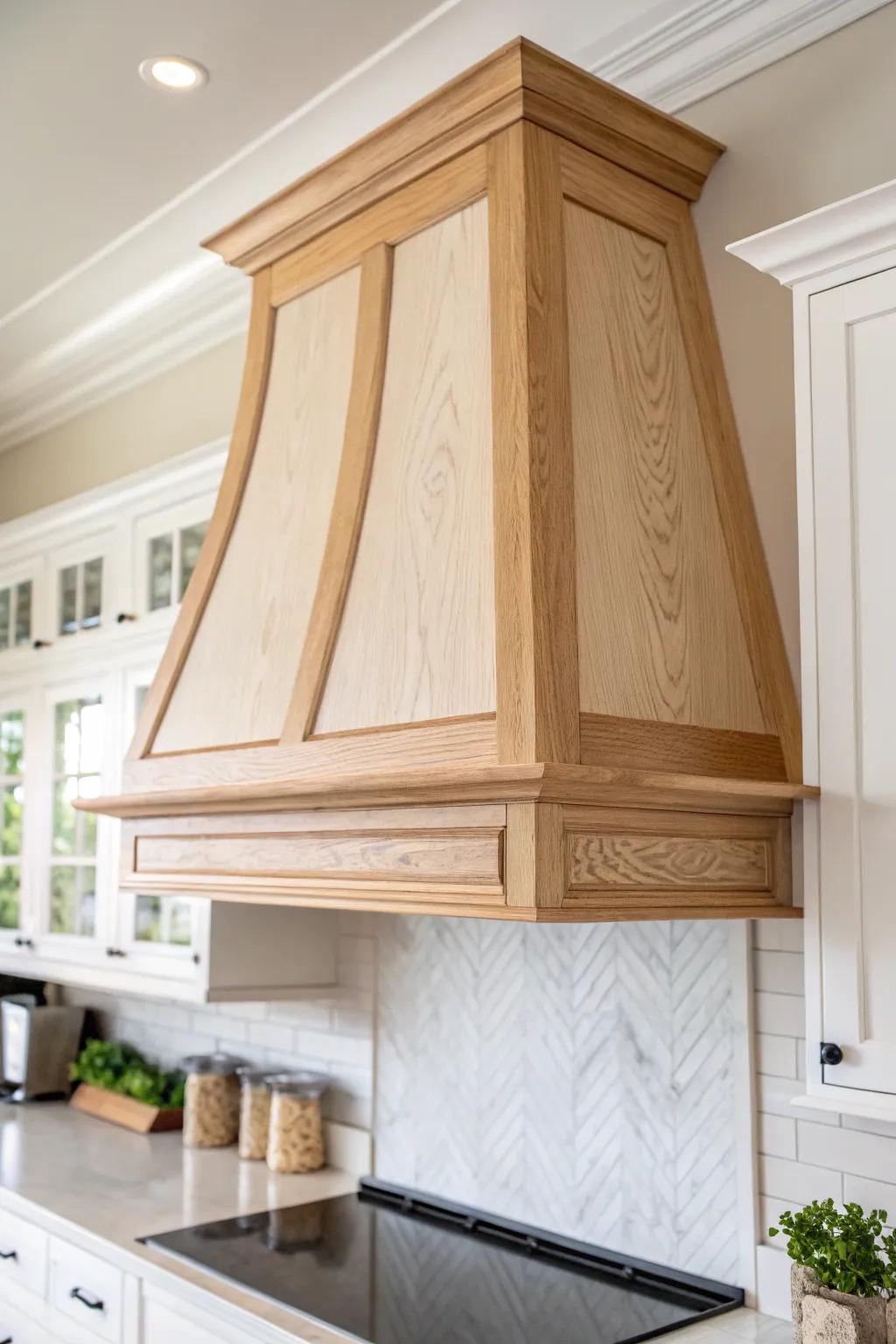 A two-tone wood range hood that echoes your island’s oak tone for a seamless, calming look.