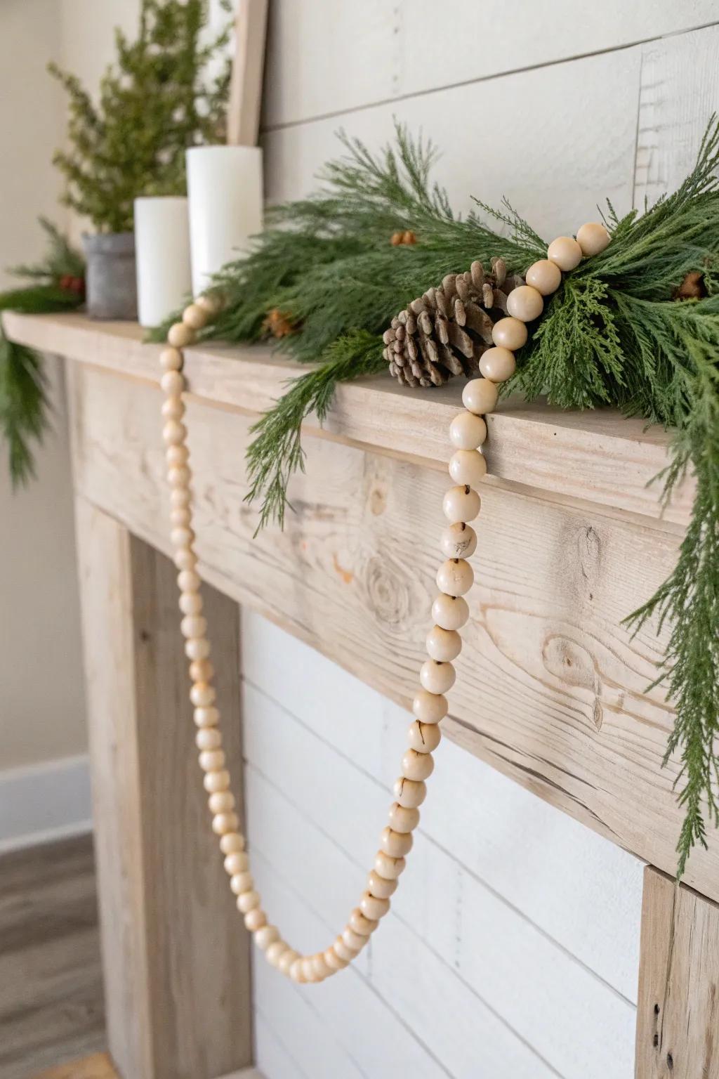 Layer a simple evergreen garland with an unfinished wooden bead strand for warm farmhouse charm.