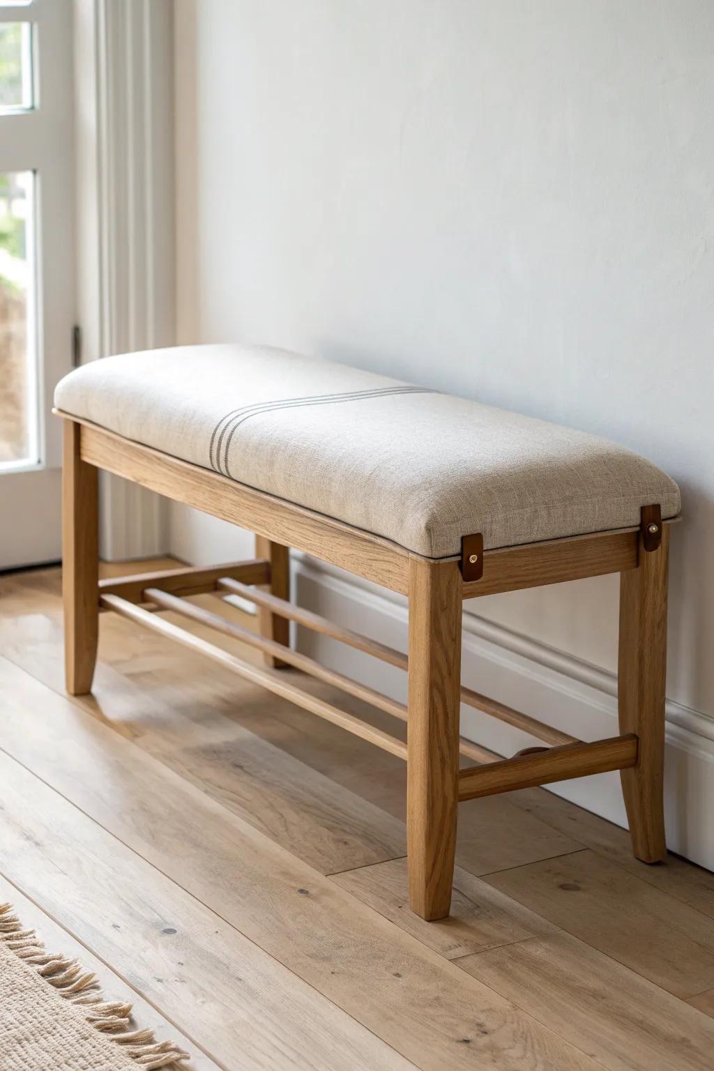 A cushioned oak bench that makes shoe time comfy—minimal, warm, and beautifully crafted.